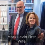 Mark Levin First Wife posing with a woman in front of a bookshelf with historical books and a framed painting.